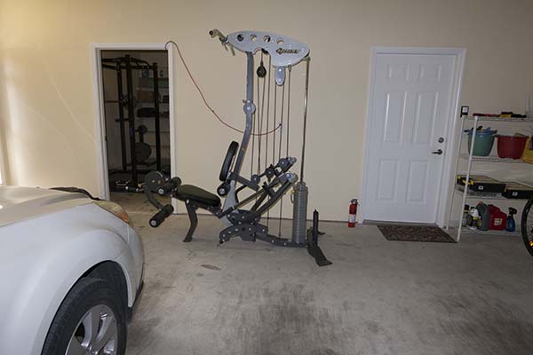 Photograph of Hoist V5 vertical gym inside a garage.